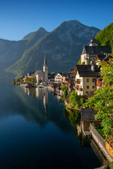 Fototapeta premium Beautiful Hallstatt Village in Sunshine. The famous lakeside town of Hallstatt in the Austrian Alps, Salzkammergut region, Upper Austria, Europe. 
