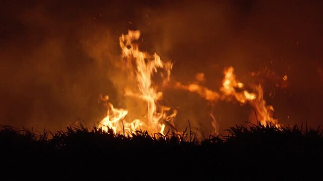 Wildfire burning at night causing air pollution