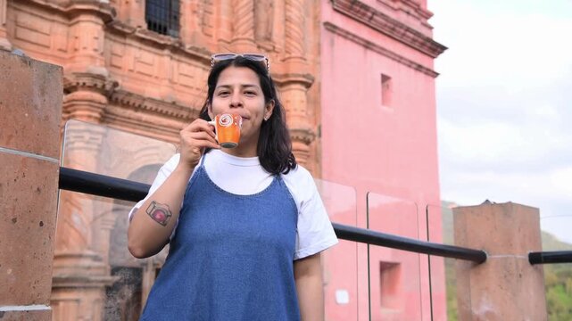 Traveler Enjoying a Coffee at San Pedro and San Pablo Parish
