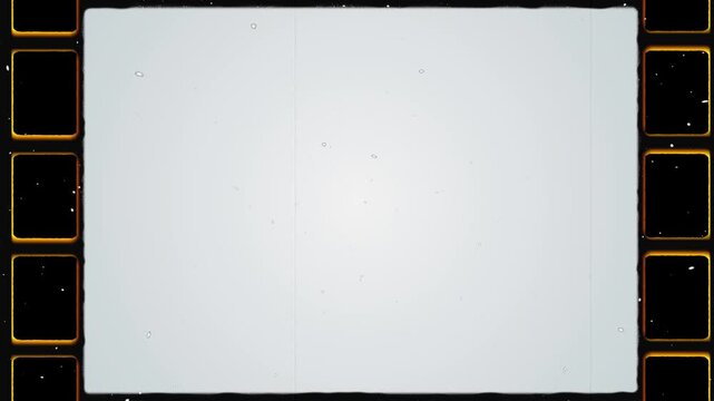 8mm Film Frame Overlay. Noise Dust Scratches Film Grain Flickering. Doodle noise, dust and grain on old damaged film surface.
Vintage looping film strip background. Super 35mm Film Grain.