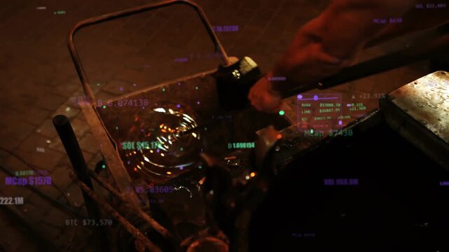 Glassblower steadying pipe, shaping bubble, dipping trough to cool while crypto labels projecting