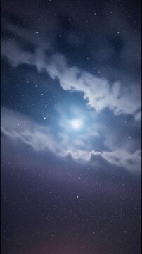 Moonlight Shining Through Cloudy Night Sky.
