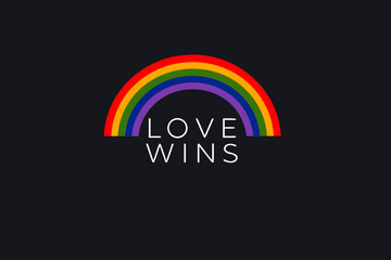 Obraz premium A colorful rainbow and the phrase love wins on a dark background