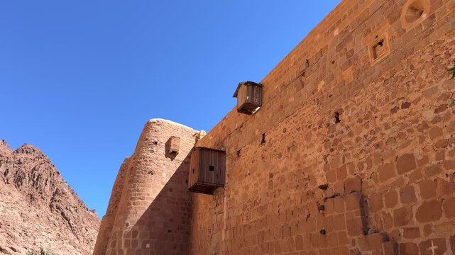 Saint Catherine Monastery defensive wall in rocky mountain landscape