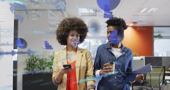 Two women walking office, left phone-activating blue HUD over faces, right sipping coffee, sharing