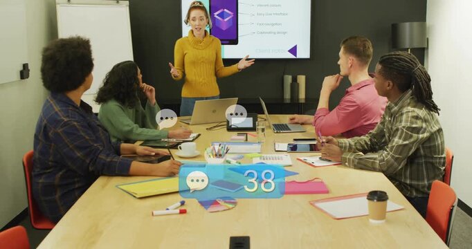 Vertical video: Presenter speaking and gesturing at table raising chat bubble count for business