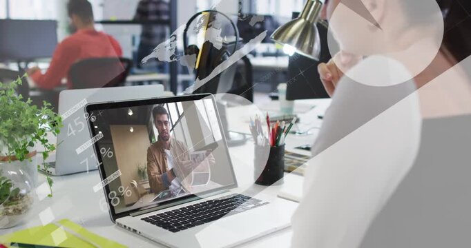 Woman at desk watching presenter showing page on laptop, charts sweeping across for business report