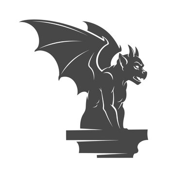 Dark gargoyle statue perched on a stone ledge