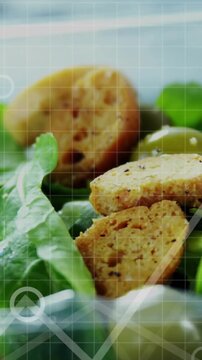 Vertical video: Green salad having data overlay appearing, camera shifting to visualize nutrition