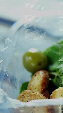 Vertical video: Camera shifting, clear container revealing olives and greens, overlays showing HUD