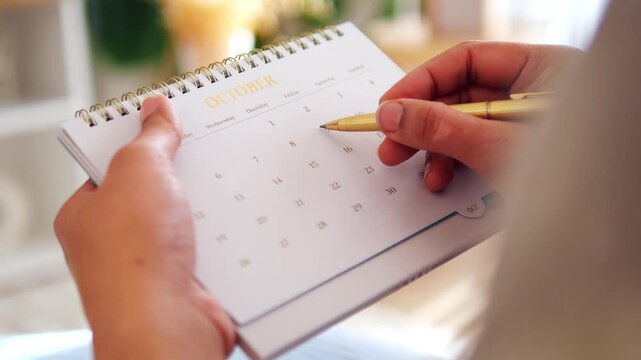 Writing on a calendar in October