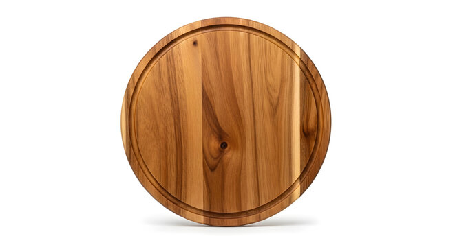 A top down view of a circular wooden cutting board with natural grain and a juice groove around the edge