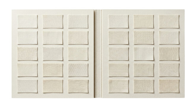 Open catalog book displaying woven fabric swatches