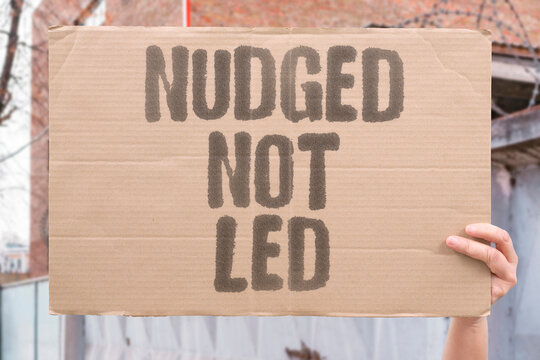 "Nudged Not Led" Algorithmic nudges steer user behavior in ways that serve platform interests more than user wellbeing. ALGORITHM. DIGITAL. SOCIAL. NUDGE. BEHAVIOR.