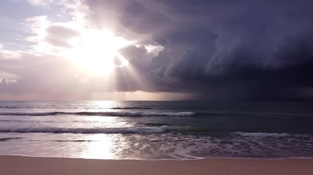 Sunbeams break through storm clouds.