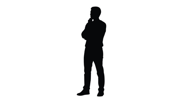 Silhouette of a thoughtful man standing with arms crossed