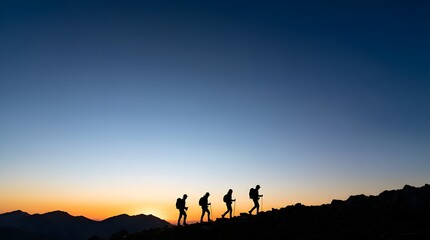 Fototapeta premium Silhouettes of hikers trekking along a mountain ridge during a vibrant sunset. Warm orange glow meets deep blue sky, creating a dramatic outdoor adventure scene. Concept of teamwork, and freindship.