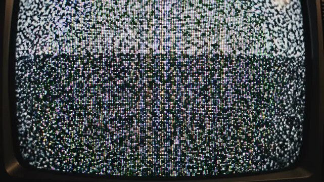Glitch noise static with television screen effect concept. Close up of vintage television screen displaying static noise and test pattern in black and white