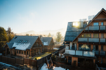 Fototapeta premium Traditional mountain houses in Zakopane in winter landscape in Tatra Mountains in Poland