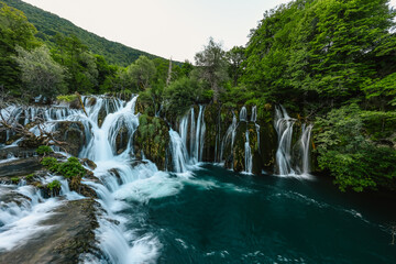 Fototapeta premium Great Una Waterfalls at Strbacki Buk, nature's power in Una National Park, Bosnia and Herzegovina.