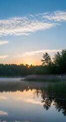Fototapeta premium Beautiful serene sunrise over a calm forest lake in Canada.
