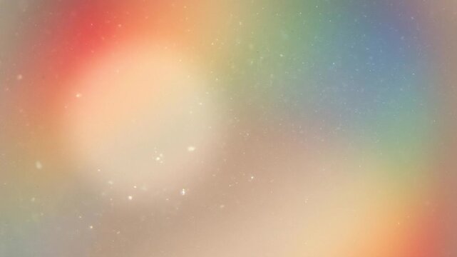 Cinematic abstract view of soft rainbow gradient background with glowing particles and blurred light orb in ethereal space