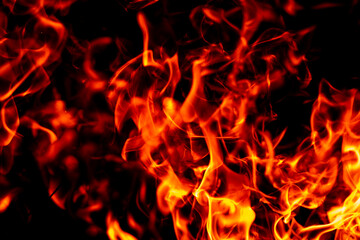 Fototapeta premium Fire background. Fire sparks. Fire flame texture. Fire glowing effect.