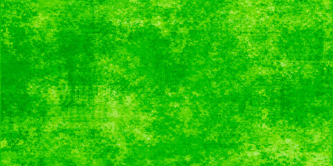 Fototapeta premium A vintage green abstract background featuring a grunge paint texture on aged paper with a rough canvas pattern for a textured nature backdrop design