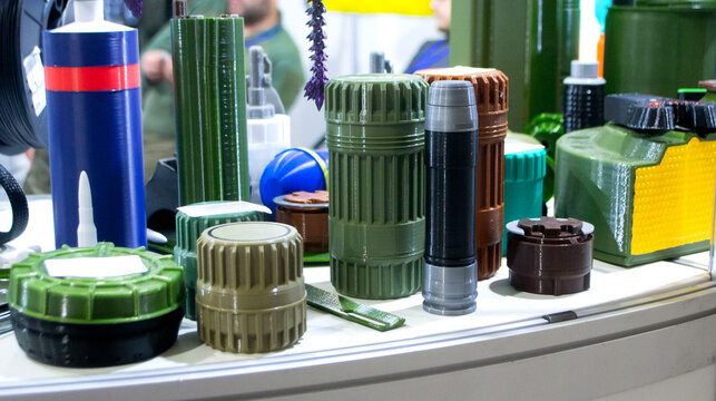 Plastic grenade body and shank stabilizer printed on 3D printer from melted plastic. Grenade created on 3D printer. Prototype of ammunition printed on 3D printer. Innovation 3d printing. Innovation