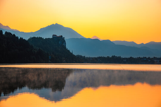 Bled, Slovenia. Bled Castle with Lake Bled with the Church of the Assumption of Maria and Julian Alps in the background