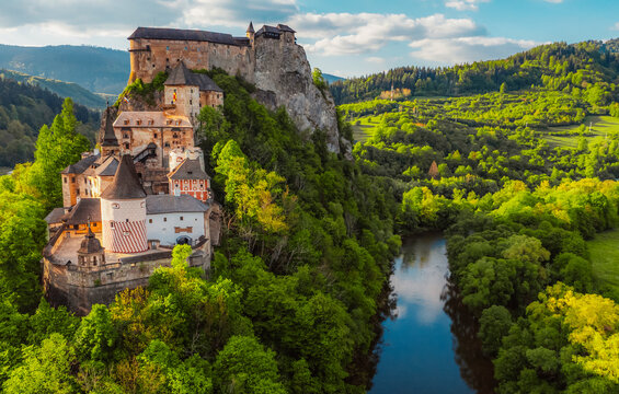 Orava castle or oravsky hrad in Oravsky Podzamok in Slovakia.  Medieval castleon high cliff by the Orava river.