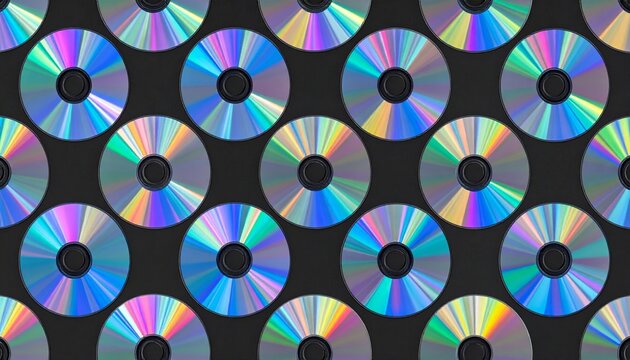 Reflective Rainbow Spectrum CDs Arranged in a Repeating Pattern on Dark Textured Surface