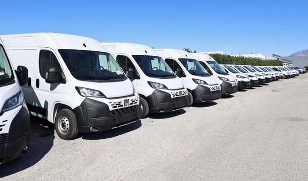 Tavagnacco, Italy. April 3, 2026. Long row of Fiat&nbsp; commercial vehicles, lined up by the&nbsp; dealership. Models are Ducato, Scudo and Fiorino.