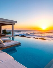 Fototapeta premium Luxury infinity pool reflects golden sunset over a turbulent ocean with lounge chairs