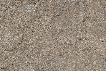 Detailed texture of flat gray pebble dash plaster wall © lucky pics