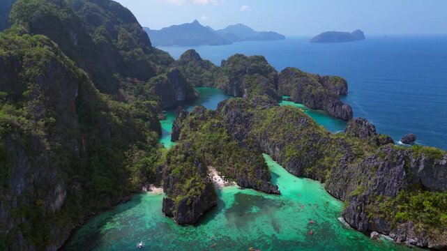 Big Lagoon in El Nido, Palawan showing limestone islands, clear turquoise water, and scenic ocean views. Unbelievable aerial view
panorama overview drone