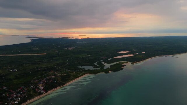 aerial drone sunset above Bantayan Island, Philippines lagoon