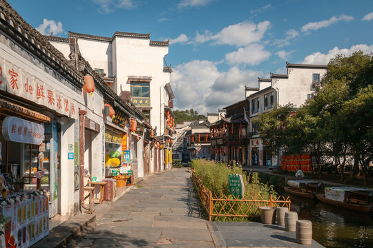 Pedestrian streets and traditional Chinese architecture buildings along water canals at the Likeng village in Wuyuan, Jiangxi, China