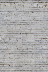 Obraz premium white brick wall texture background with peeling paint and wear