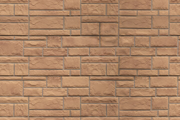 Obraz premium Stone wall made of rectangular blocks with textured surface outdoors