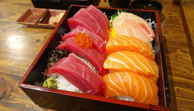 Japanese shasimi bento set on the wooden table