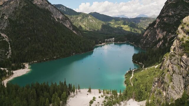 Aerial view Lago di Braies lake in Dolomites mountains. Dolomiti. Italian alps. Turquoise lake in northern Italy. Popular summer visit destination Europe. Glacier alpine lake - Pragser Wildsee