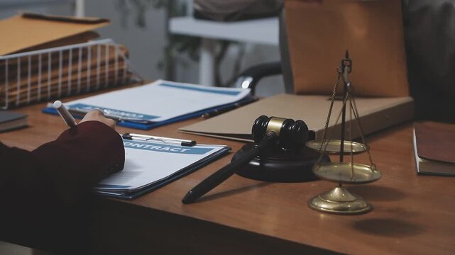 Law theme, mallet of the judge, law enforcement officers, evidence-based cases and documents taken into account.