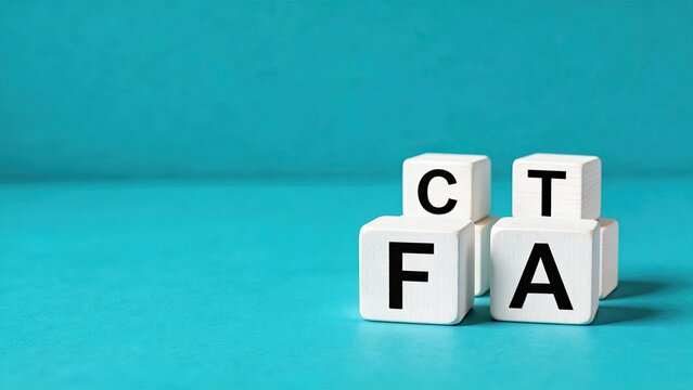 CFA concept on wooden cubes on blue background certified financial analyst education investment training accounting exam business finance professional certification career