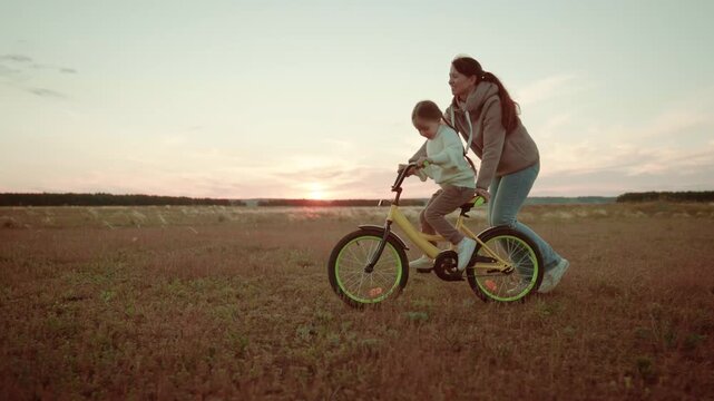 Calm evening ride, Guiding little steps, Supportive teaching, New fears conquered, Growing together, Nature&rsquo;s peace, Parent&rsquo;s pride, Learning moment, Twilit countryside, Journey of love