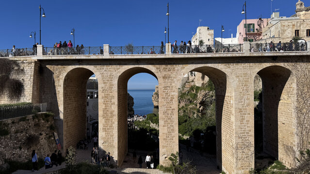 Lama Monachile bridge in Polignano a Mare Puglia with arches and Adriatic Sea