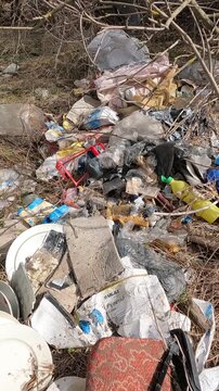 garbage in the forest. garbage in the park. garbage on the road. natural landfills. Ukrainian landscapes 4k. garbage in the environment
