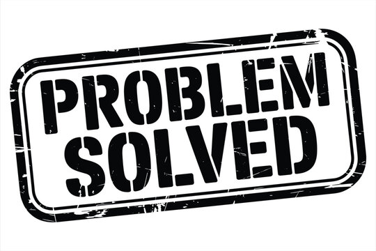 Black distressed rubber stamp impression with the text problem solved