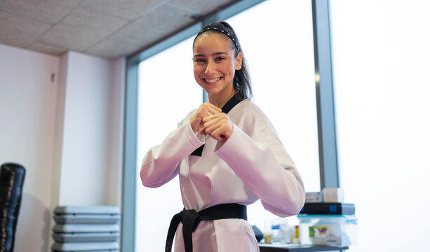 Woman practicing judo in a dojo in Madrid