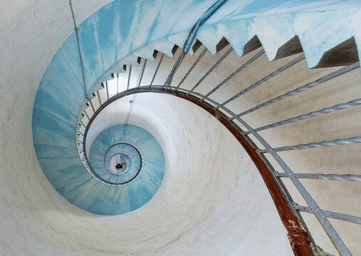Spiral staircase at Lyngvig Fyr lighthouse on danish North Sea coast near Hvide Sande, view from below